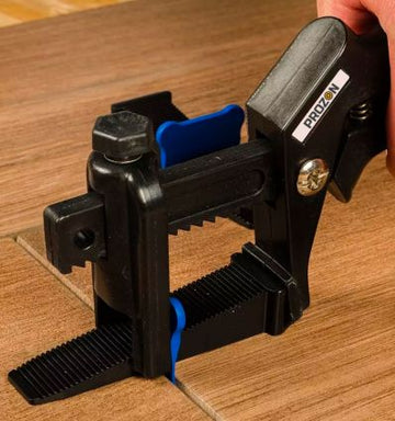 Pince croisillon autonivelant